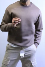 from e backElegant and Cozy Sweater with a Modern Design