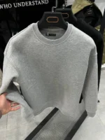 from e backElegant and Cozy Sweater with a Modern Design - Image 16